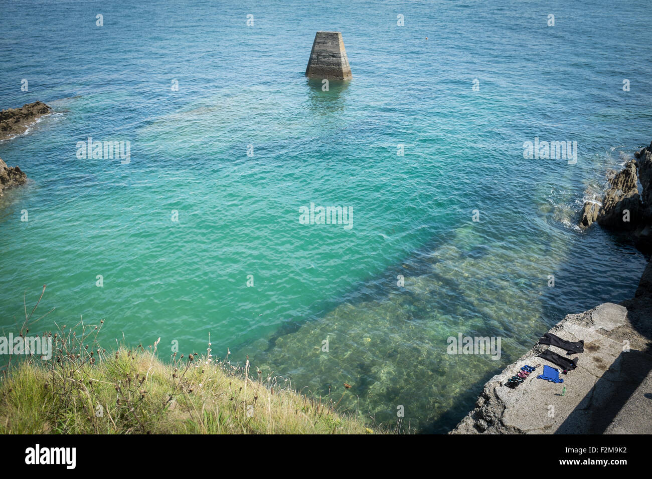 The cool clear seawater off Torpoint, Cornwall is great for swmmers and fisherman alike Stock Photo