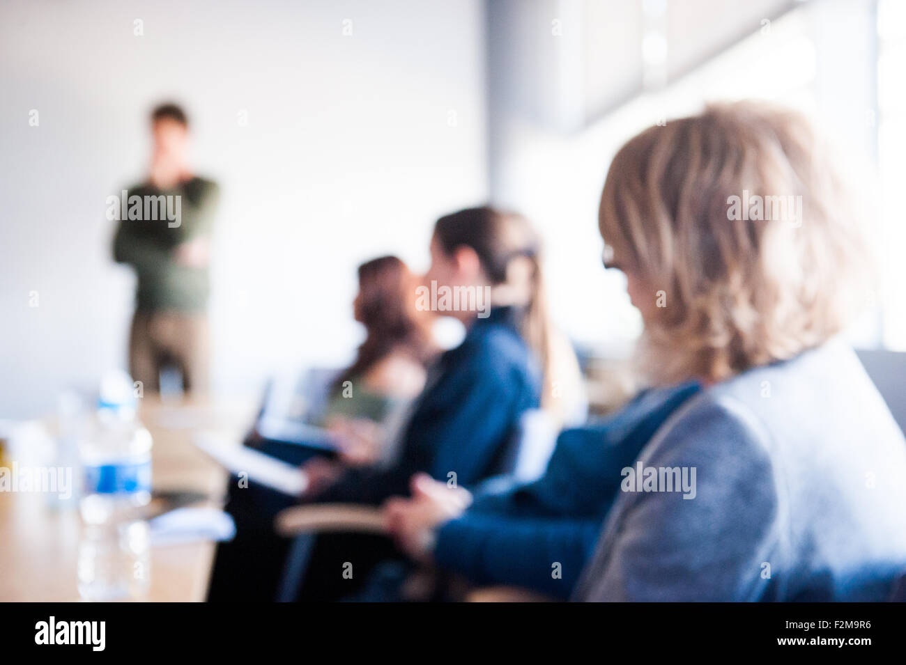 Blurred background photo of boring meeting or conference Stock Photo