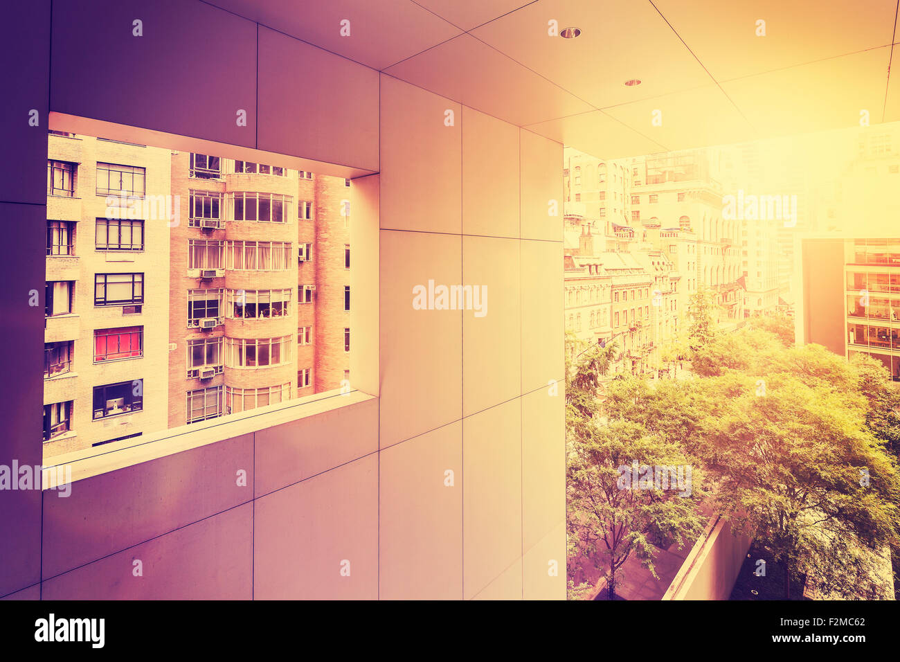 Retro vintage stylized picture of Manhattan with flare effect, New York City, USA. Stock Photo