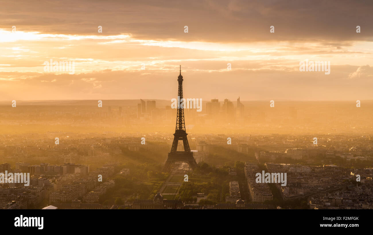 Elevated view of the Eiffel Tower, city skyline and La Defence skyscrapper district in the distance, Paris, France, Europe Stock Photo