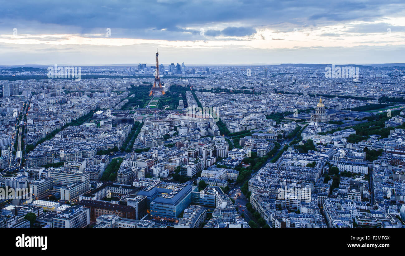 Elevated view of the Eiffel Tower, city skyline and La Defence skyscrapper district in the distance, Paris, France, Europe Stock Photo