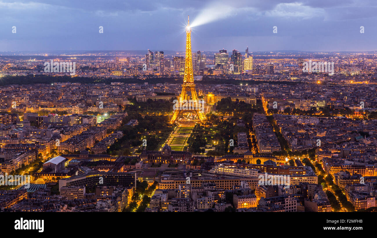 Elevated view of the Eiffel Tower, city skyline and La Defence skyscrapper district in the distance, Paris, France, Europe Stock Photo