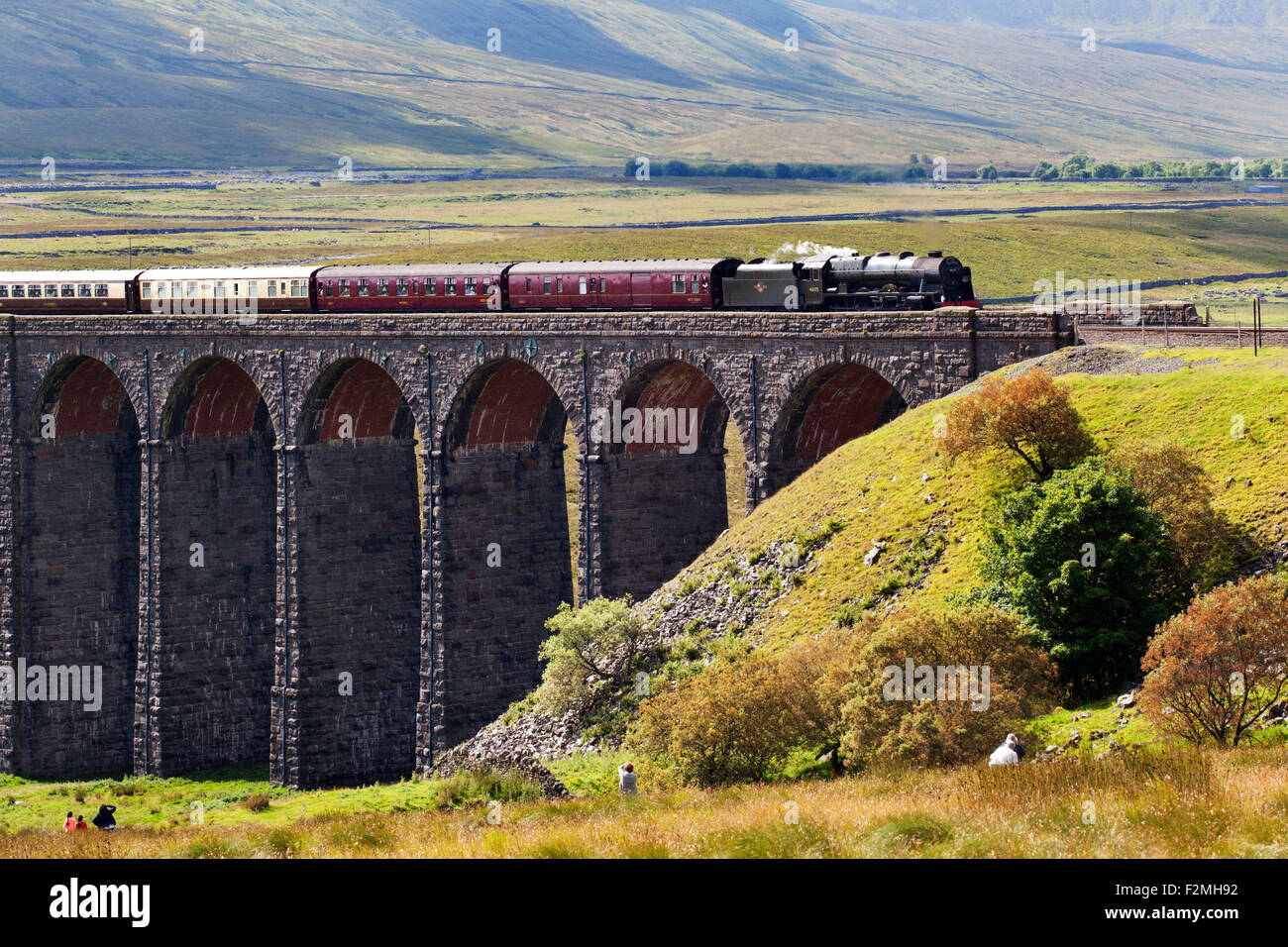 The Fellsman Hauled by 46115 Scots Guardsman Crossing Ribblehead Viaduct Yorkshire Dales North Yorkshire England Stock Photo