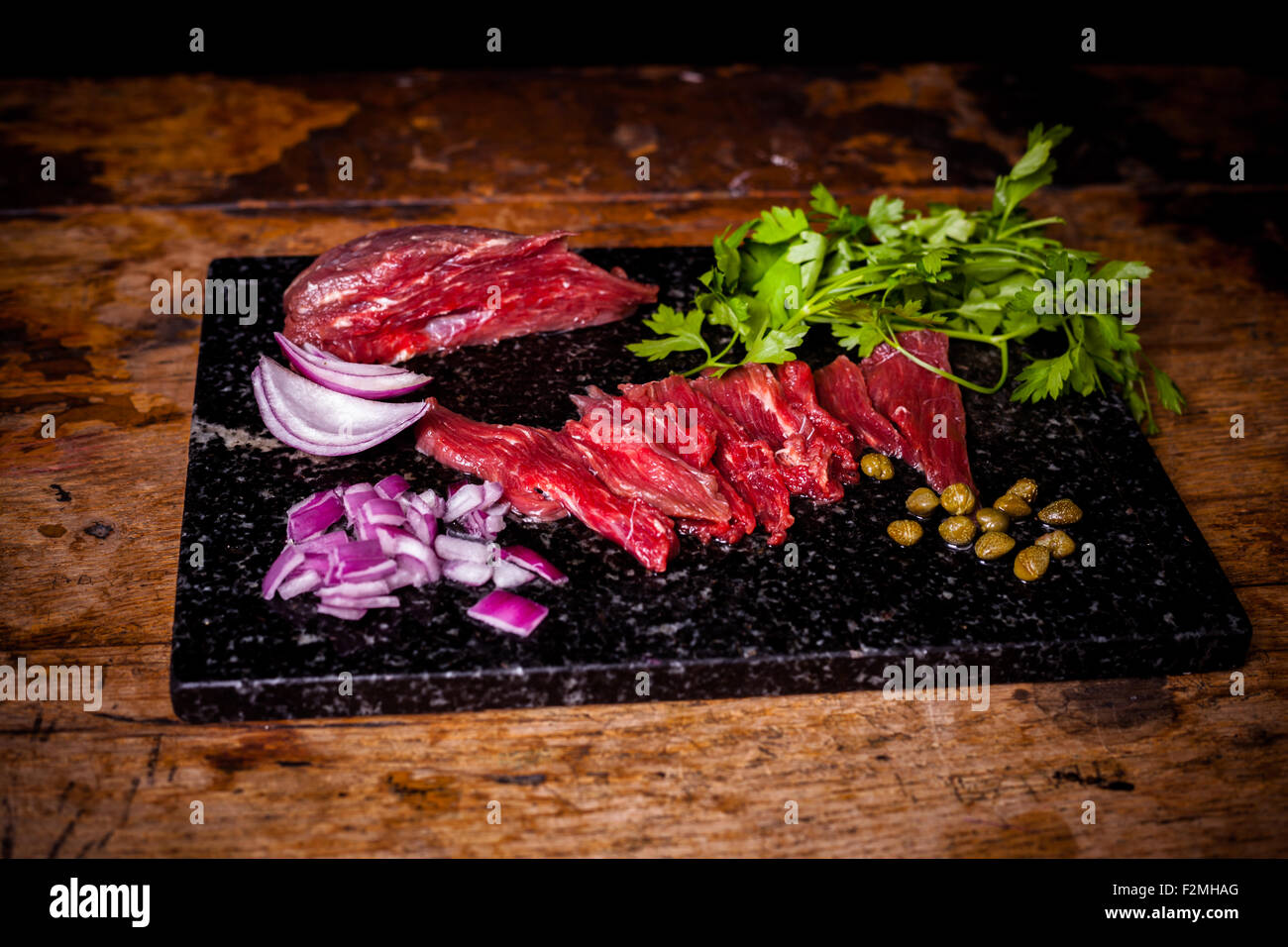 Steak tartare with a raw egg yolk Stock Photo Alamy