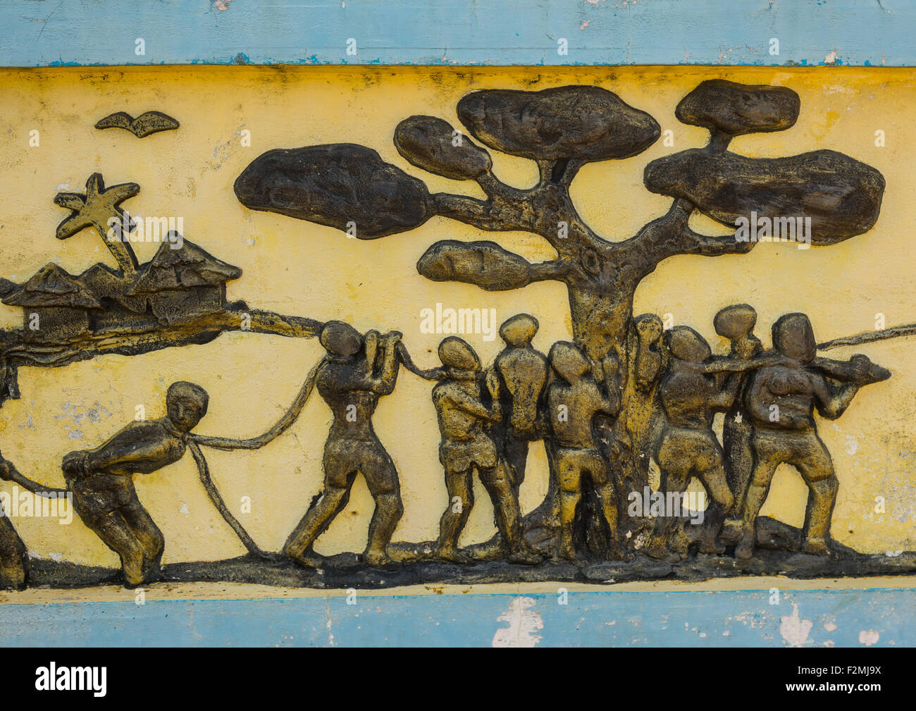 Benin, West Africa, Ouidah, the memorial zomachi on the slave trail showing slaves under a tree Stock Photo