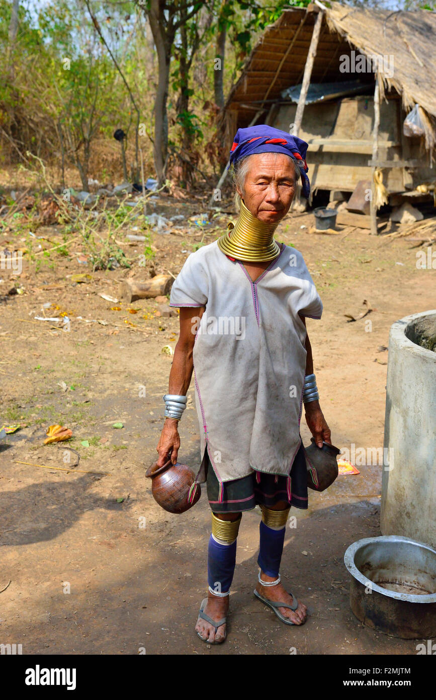 Study of a Long Necked or Giraffe Neck Burmese Padaung woman in her home at the village of Sun Bon, Myanmar (Burma) Stock Photo