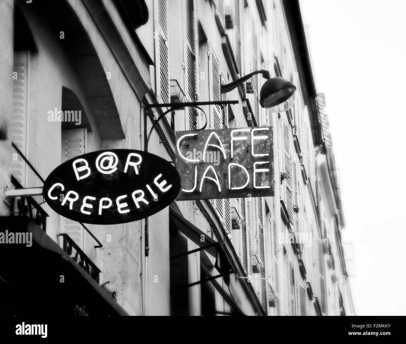 Restaurant signs in a Paris neighborhood. Stock Photo