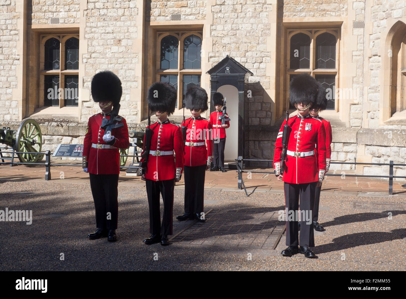 Ceremony of the Word with Guardsmen wearing bearskins at the Tower of London City of London England UK Stock Photo