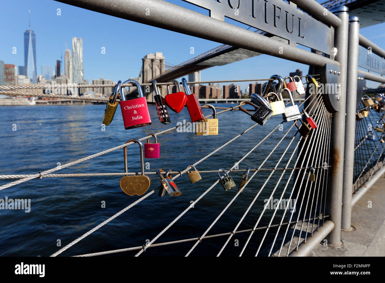 Love locks under the Brooklyn Bridge on the Brooklyn side New York City