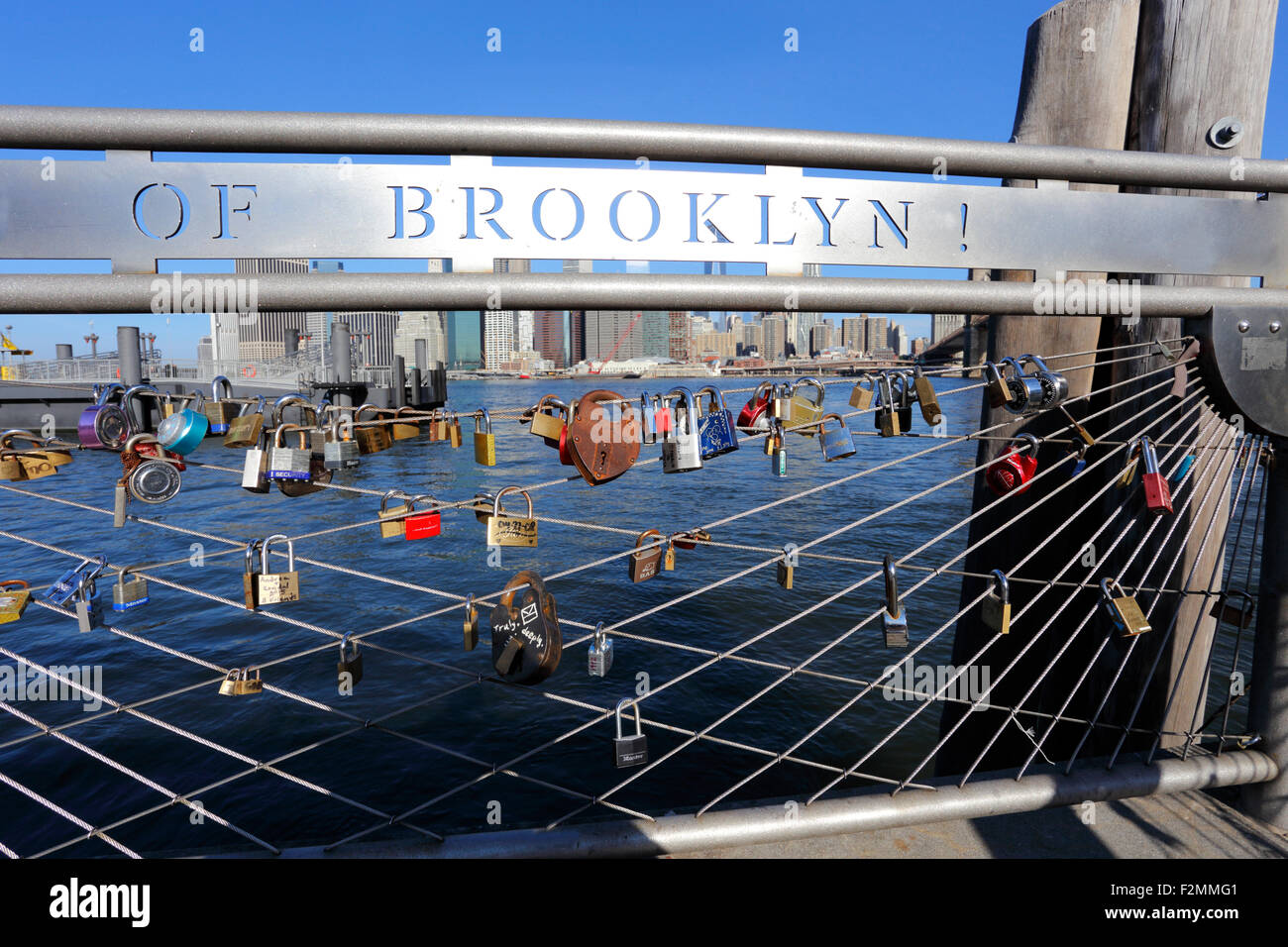 Love locks under the Brooklyn Bridge on the Brooklyn side New York City Stock Photo