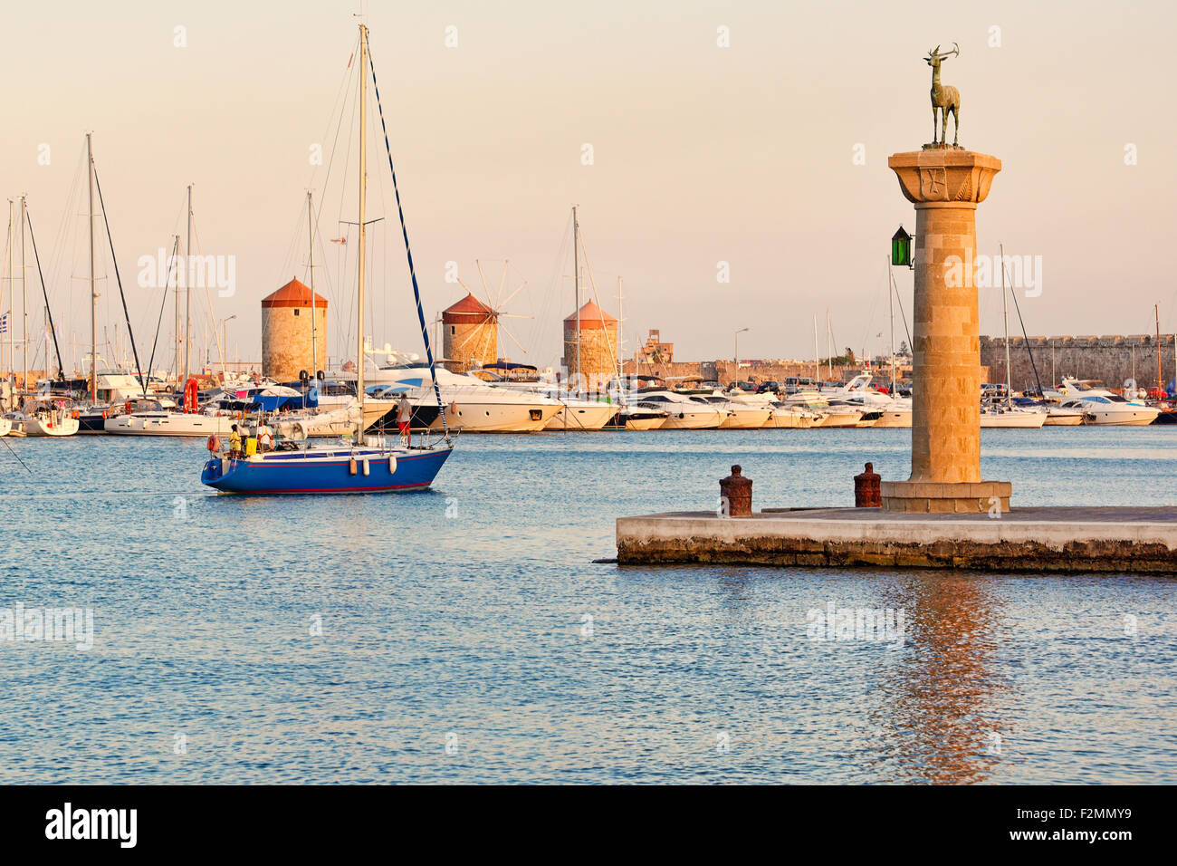 The entrance with the deers of the old port of Rhodes, Greece Stock Photo