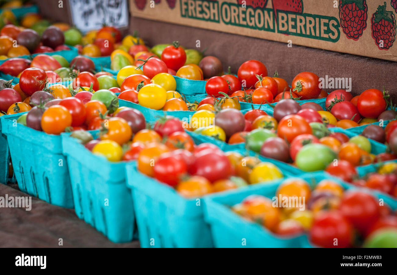 heirloom cherry tomatoes purple green yellow red Stock Photo - Alamy