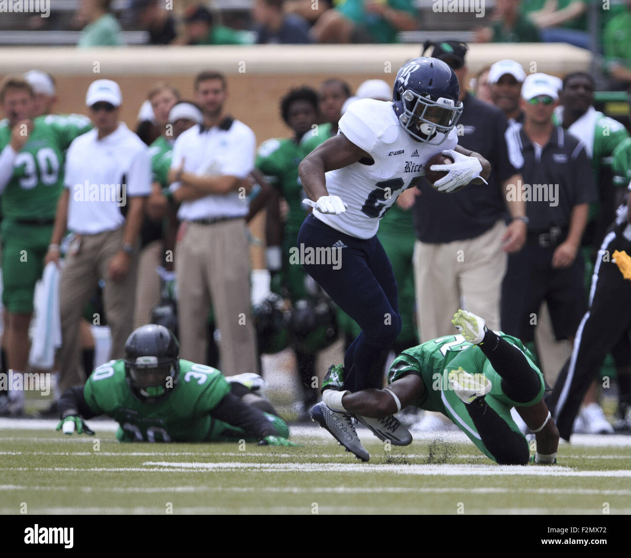 Sept. 19, 2015 - Denton, TX, USA - September 19, 2015: Rice Owls running back Austin Walter #27 during the NCAA football game between the Rice Owls and the North Texas Mean Green at Apogee Stadium in Denton, TX.  Credit: JP Waldron/ZumaPress (Credit Image: © Jp Waldron via ZUMA Wire) Stock Photo