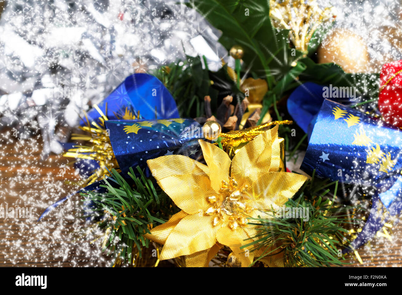 christmas decoration with a golden flower and blue ribbon Stock Photo