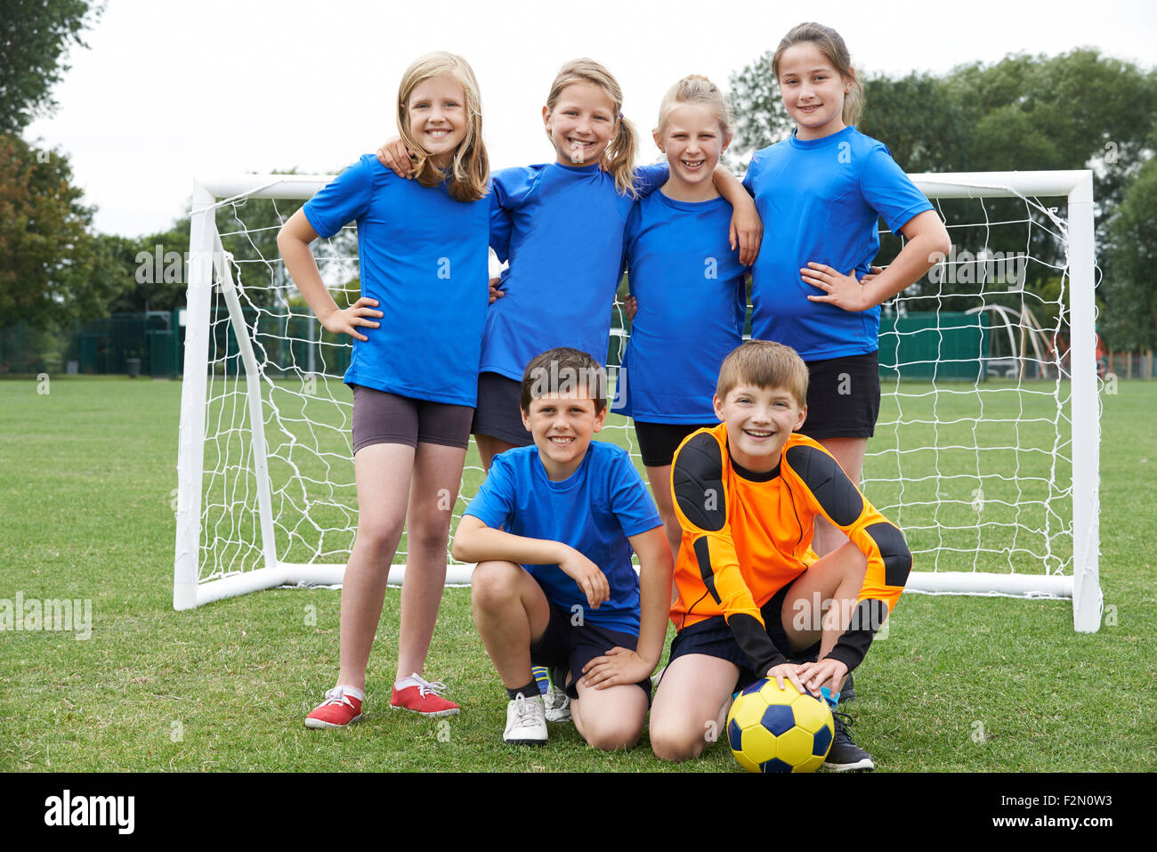 Boys And Girls In Elementary School Soccer Team Stock Photo Alamy