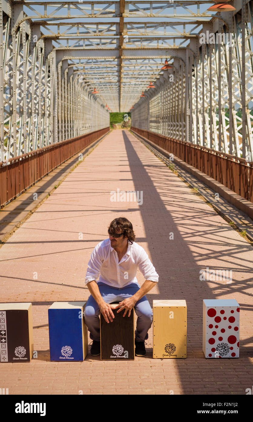 Flamenco musician with an assortment of cajon instruments Stock Photo