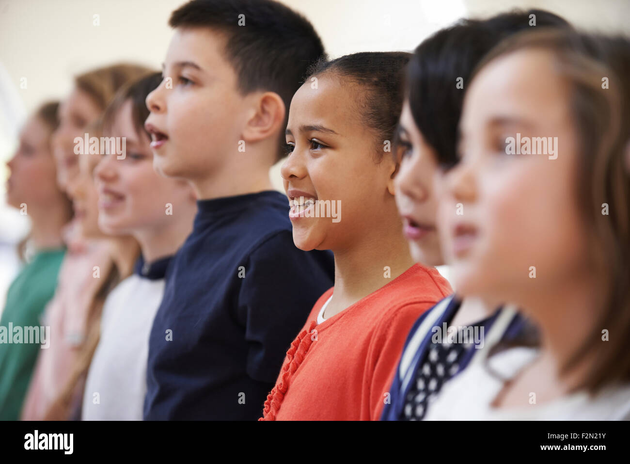 Group Of School Children Singing In Choir Together Stock Photo