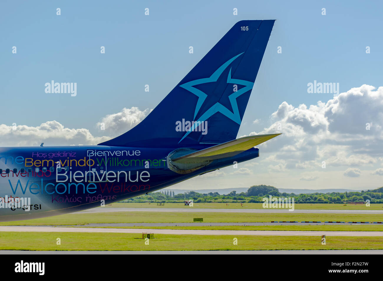 MANCHESTER, UNITED KINGDOM - AUG 07, 2015: Air Transat Airbus A330 tail livery at Manchester Airport Aug 07 2015. Stock Photo