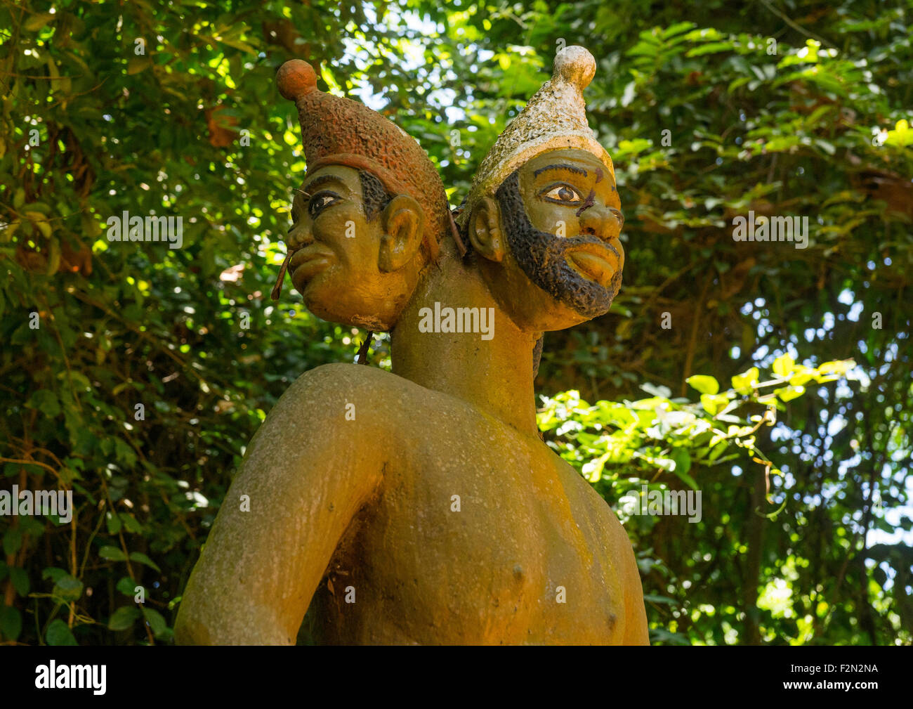 Benin, West Africa, Ouidah, statue of 3-headed voodoo deity in sacred forest of kapasse Stock Photo