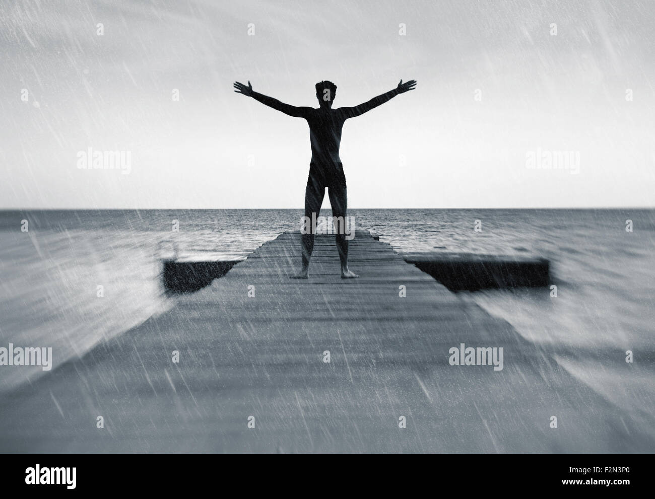Freedom in nature concept - free happy man in the rain Stock Photo - Alamy
