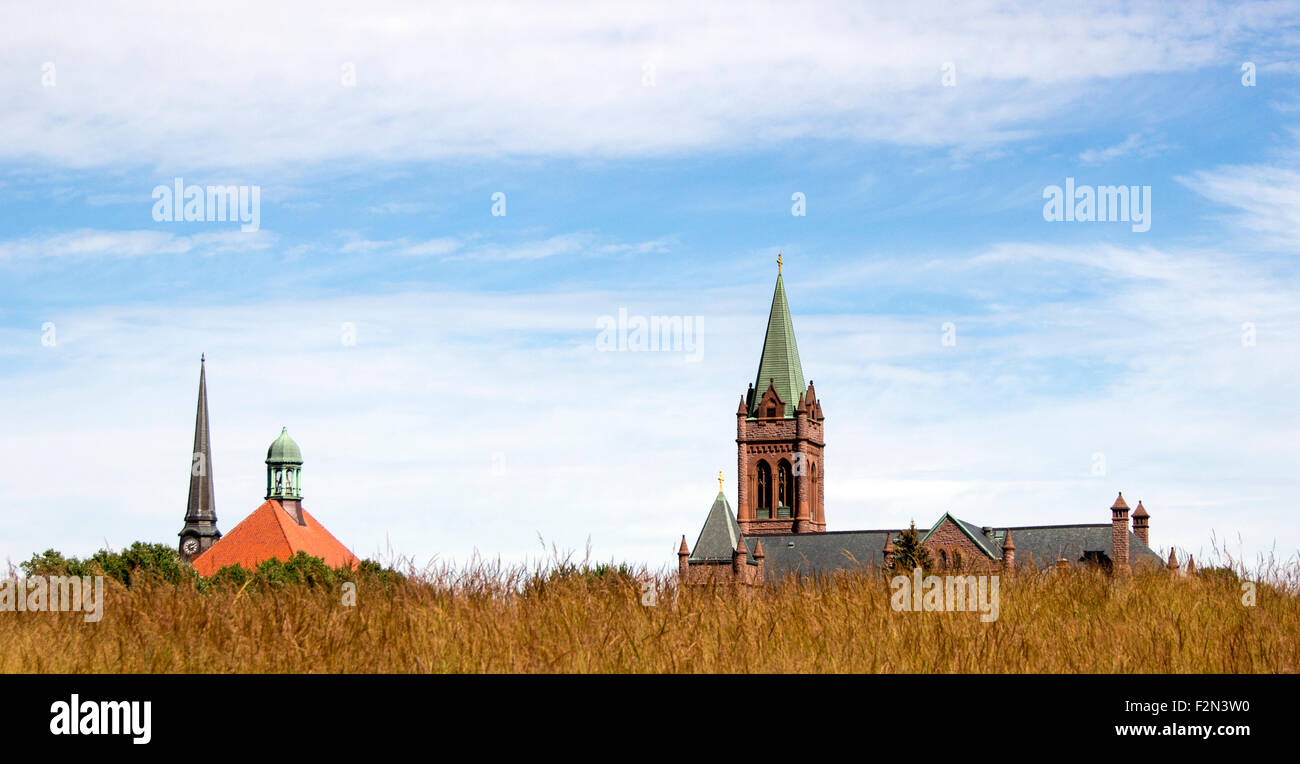 Church steeples above a meadow Rome New York USA US America. Stock Photo