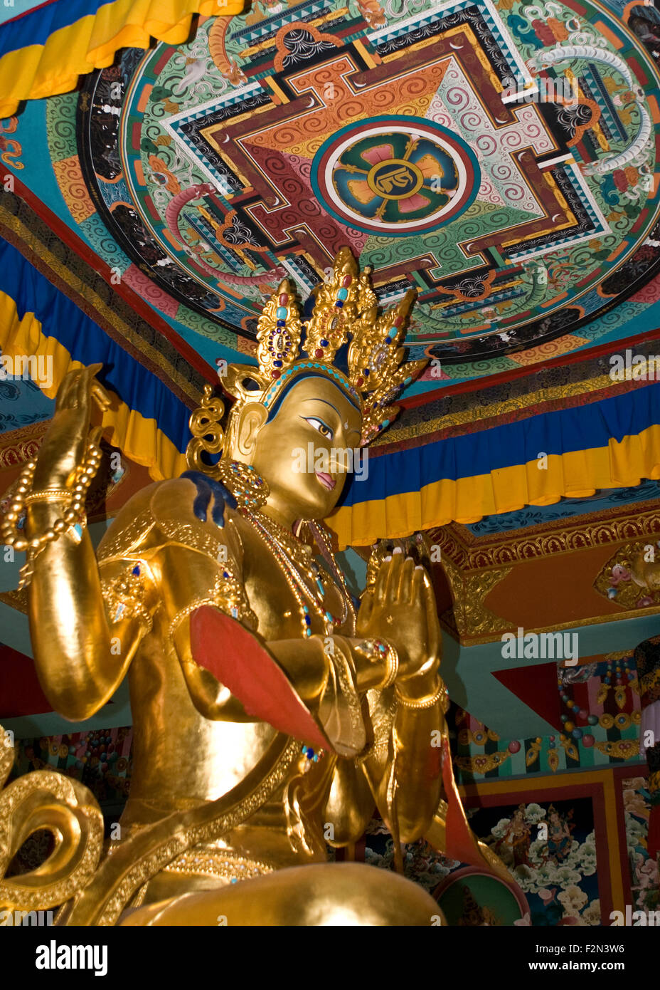Avalokiteshvara Bodhisattva, Chenrezig, Buddha of Compassion, Golden Temple Kushalnagar Bylakuppe Karnataka India. Stock Photo