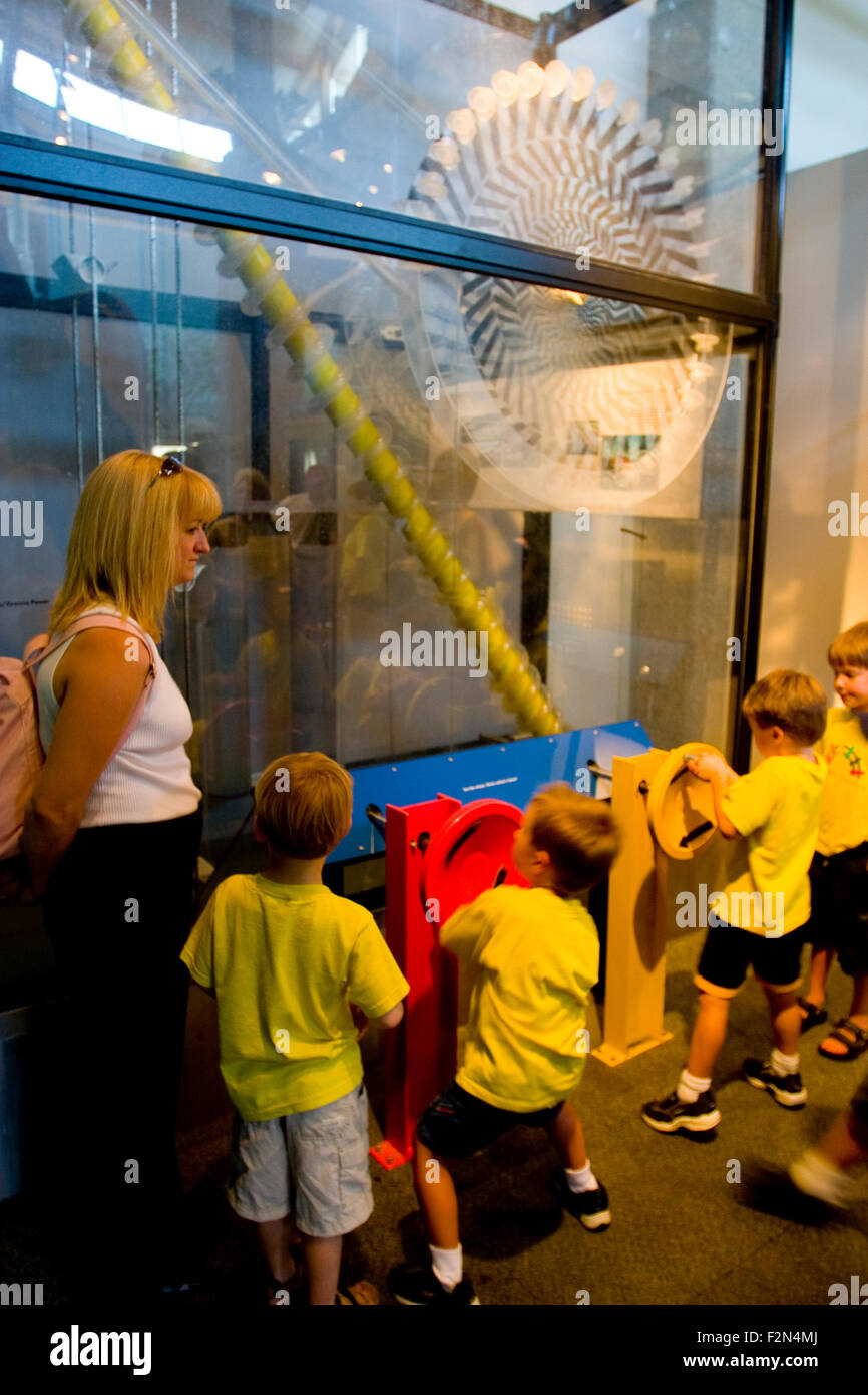 Kids meet sea otters at the Children's Farm, part of the nature center