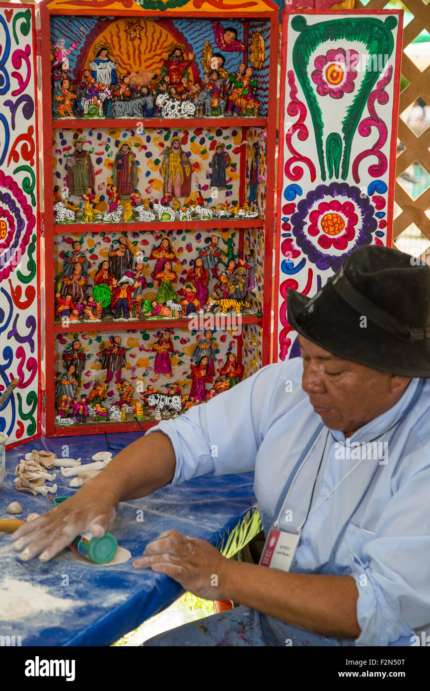 Peruvian Artisan and his Retablo (Story Box), from Ayacucho. Stock Photo