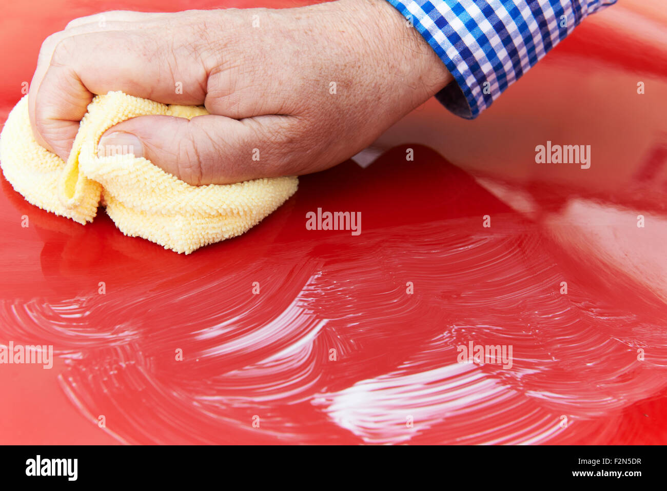 Close Up Of Hand Polishing Car Hood Using Cloth Stock Photo Alamy