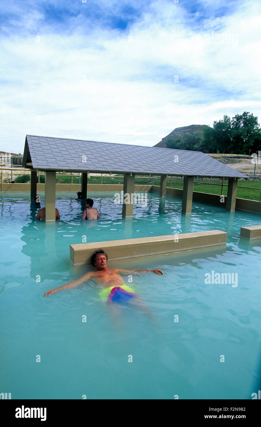 A relaxing soak in a hot mineral pool at Hot Springs State Park, Thermopolis, Wyoming, USA. Stock Photo