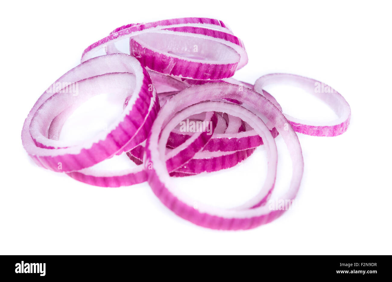 Red Onion rings isolated on pure white background (close-up shot) Stock Photo