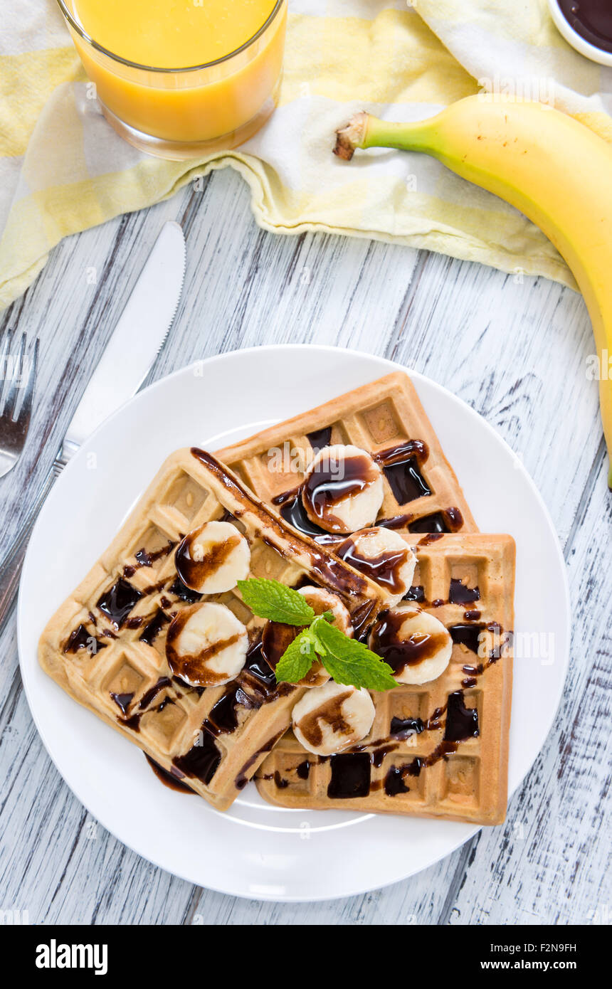 Waffles with Bananas and Chocolate Sauce (close-up shot Stock Photo - Alamy