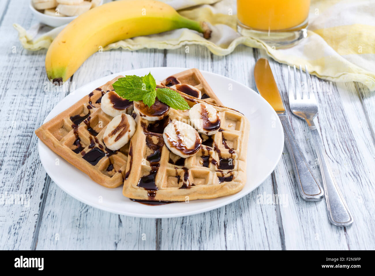 Sweet Breakfast (Waffles with Bananas and creamy Chocolate Sauce Stock ...