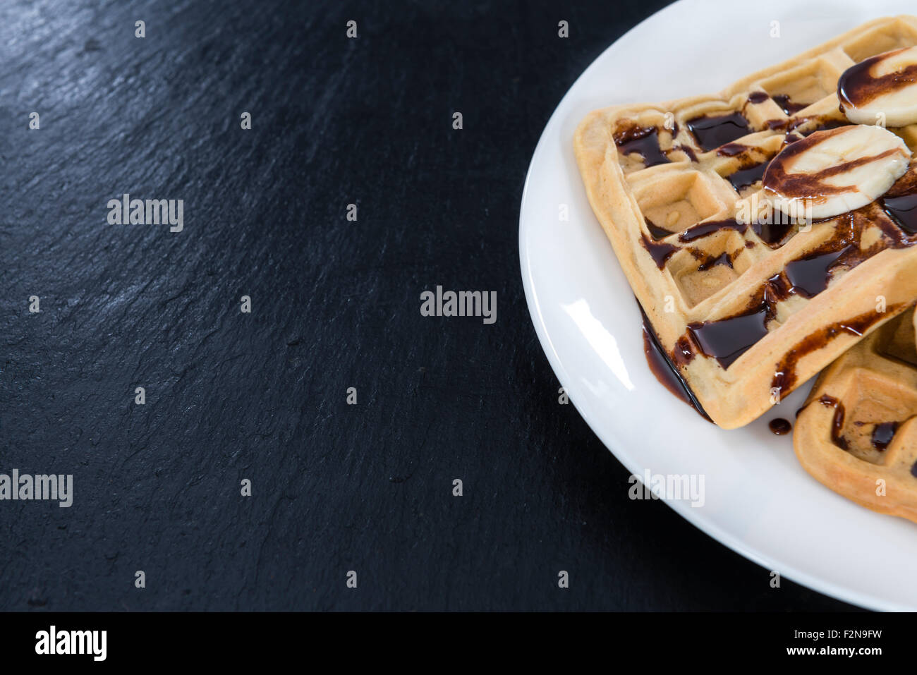 Sweet Breakfast (Waffles with Bananas and creamy Chocolate Sauce Stock ...