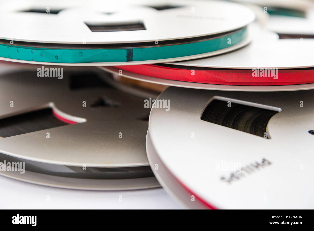 Several Philips reel to reel tape reels in a scattered pile