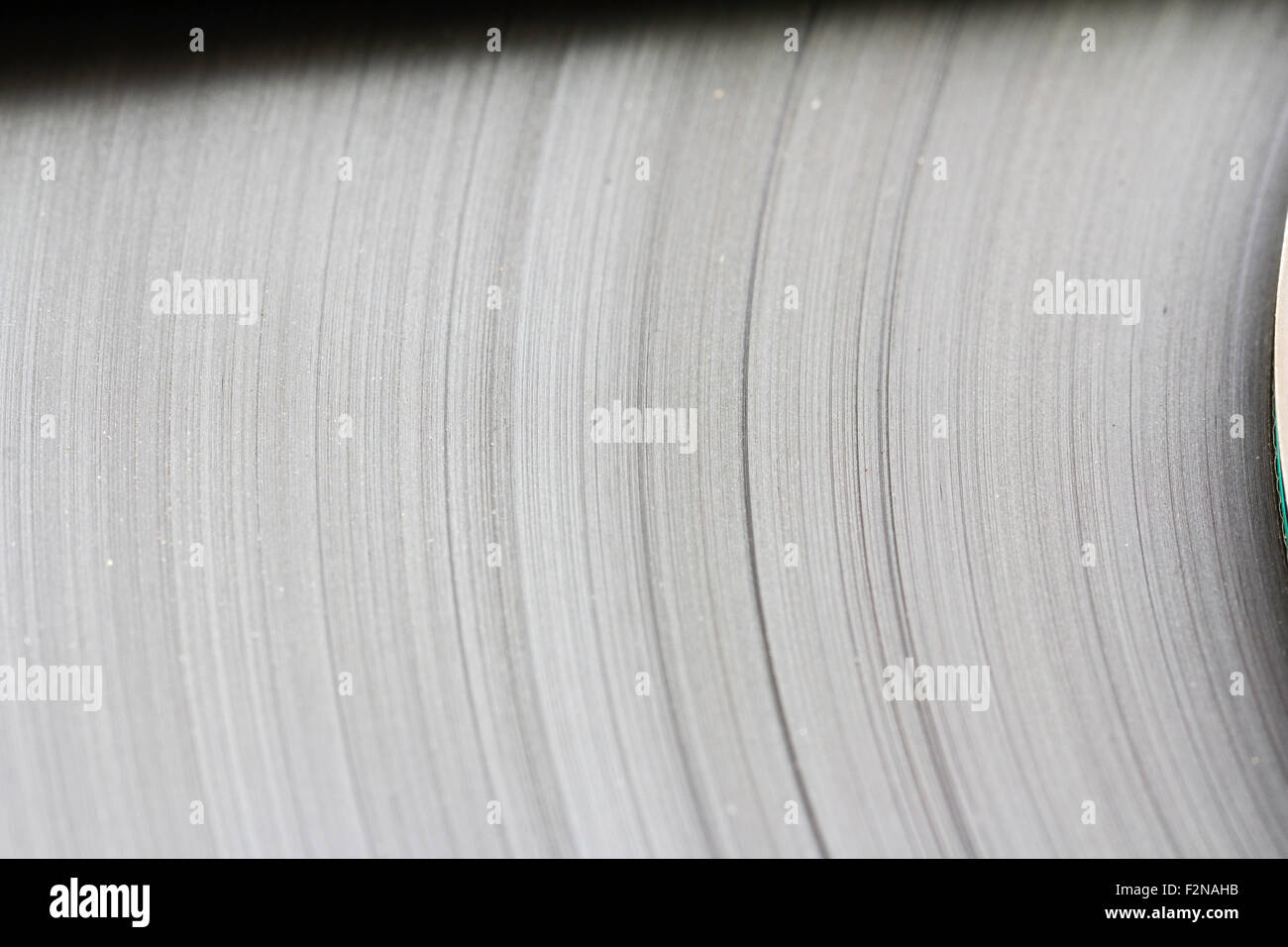 Spool of recording brown reel to reel tape. Tightly wound