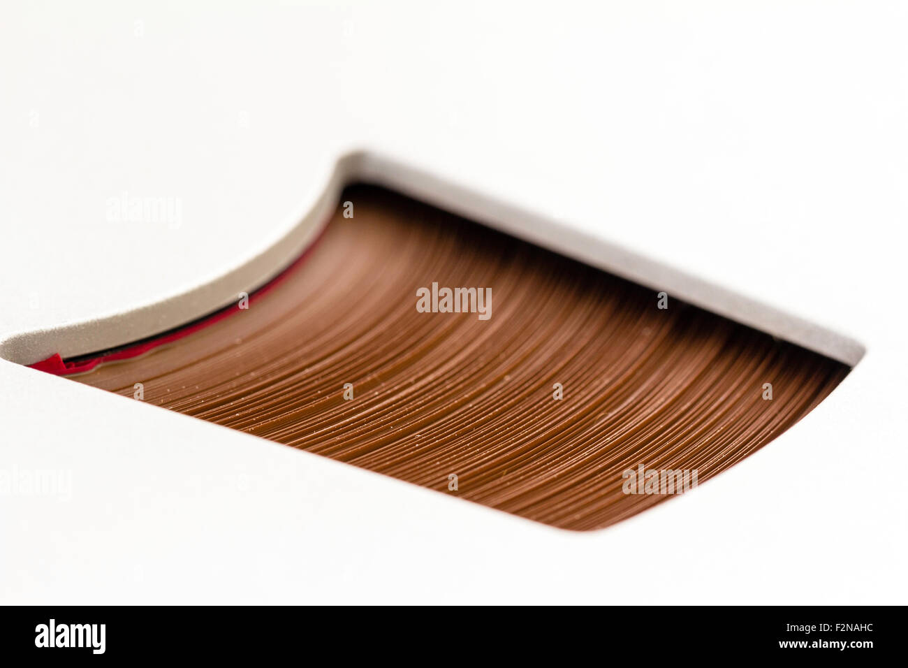 Spool of recording reel to reel tape. Spool is light grey