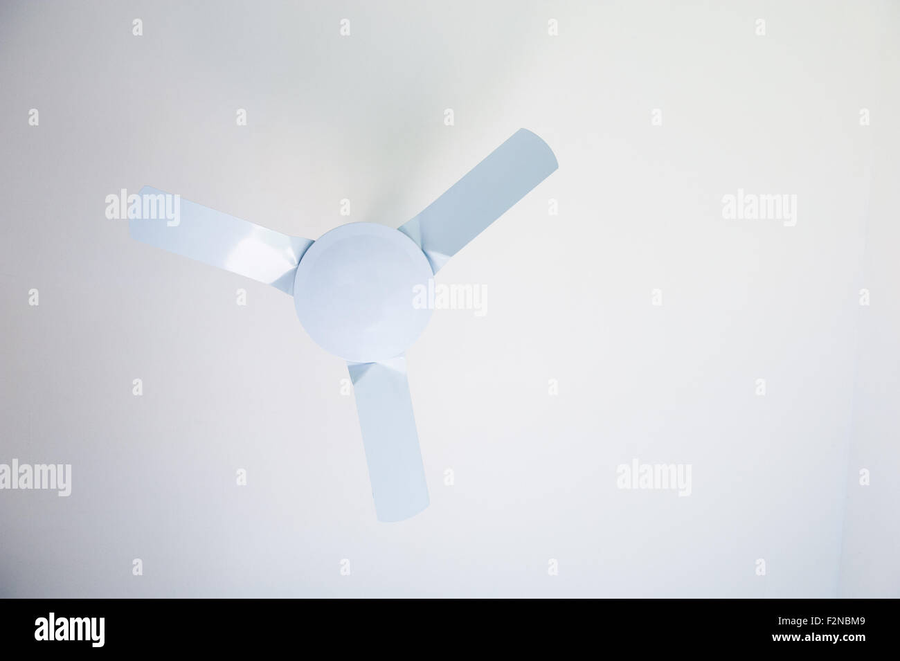 Fan on white ceiling in black and white with copy space Stock Photo Alamy
