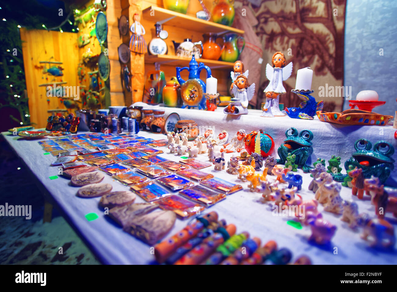 Small pavilions of Riga's Old Town (Latvia) Christmas market offering variety of souvenirs and handmade Christmas gifts Stock Photo