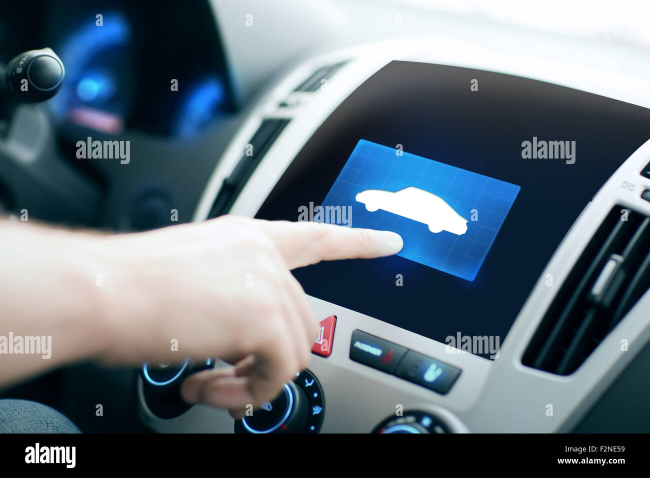 male hand pointing finger to car icon on panel Stock Photo