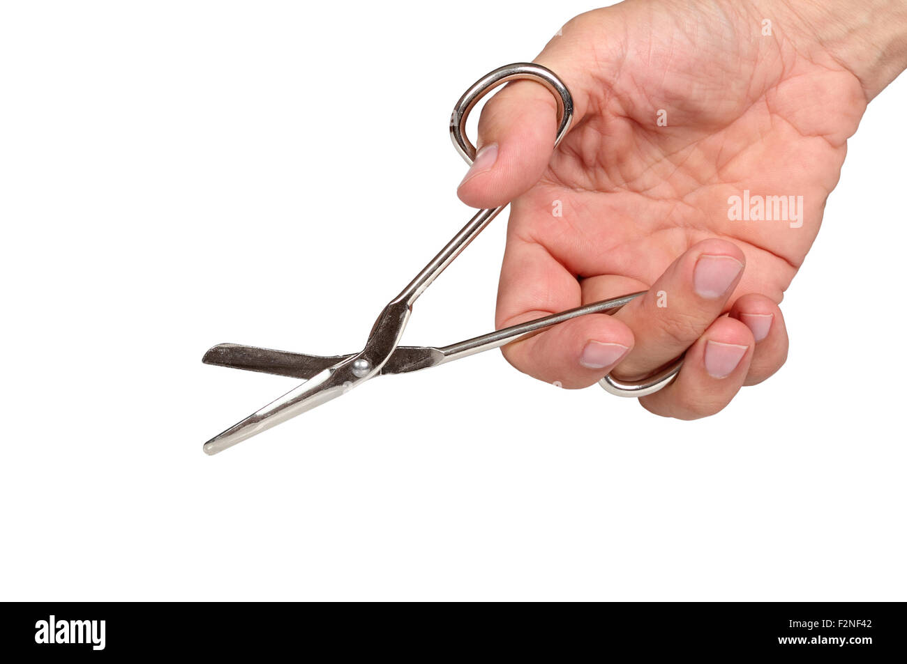 Hand with open first aid scissors. Isolated with clipping path Stock