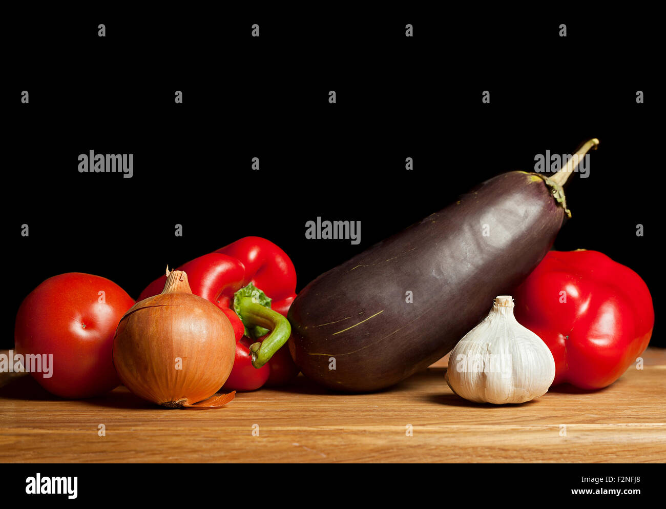 Eggplant and vegetable ingredients for salad Stock Photo Alamy