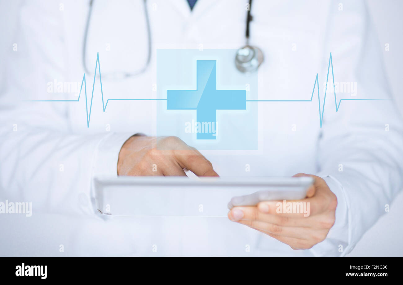 male doctor holding tablet pc with medical app Stock Photo - Alamy