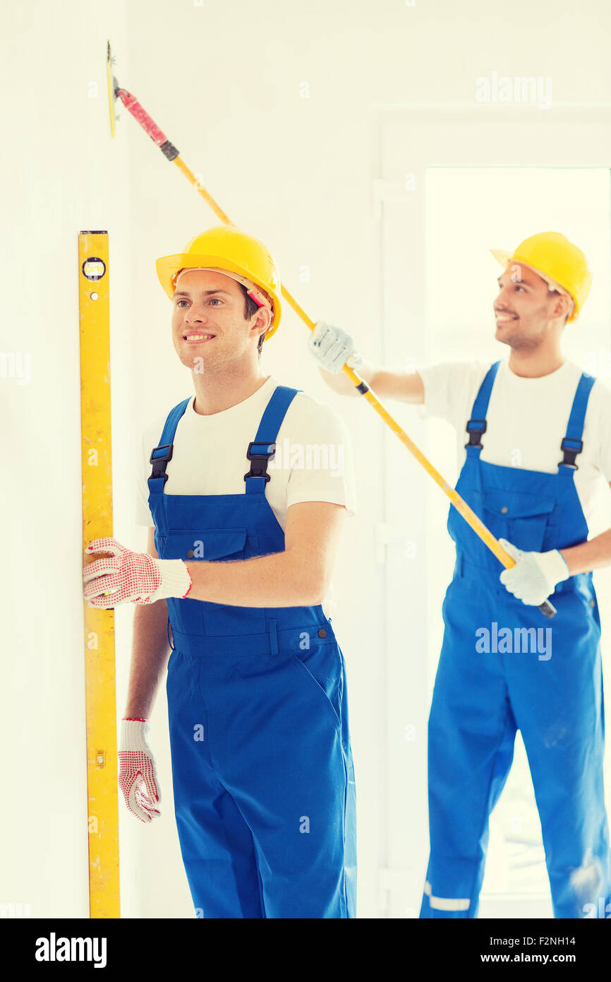 group of builders with tools indoors Stock Photo Alamy