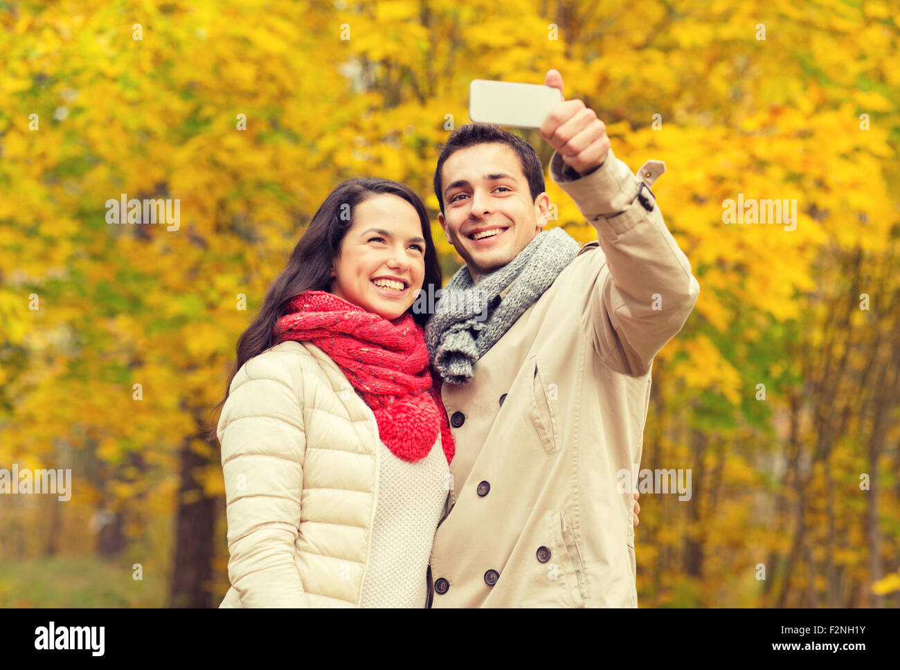 Teenage couple hugging in park hi-res stock photography and images - Alamy