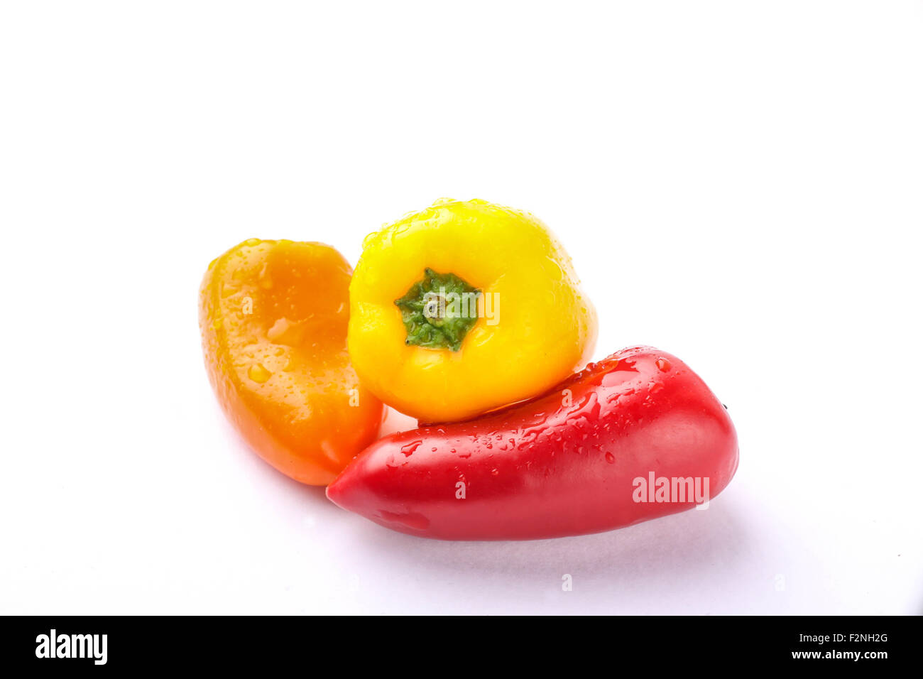 three types of pickled pepper isolated on white background Stock Photo