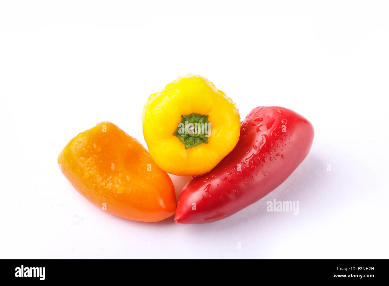 three types of pickled pepper isolated on white background Stock Photo