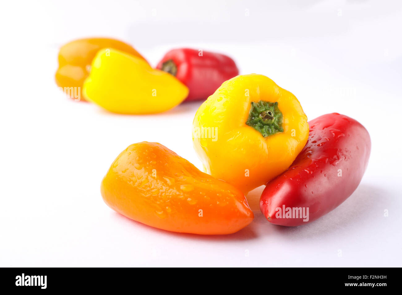 three types of pickled pepper isolated on white background Stock Photo