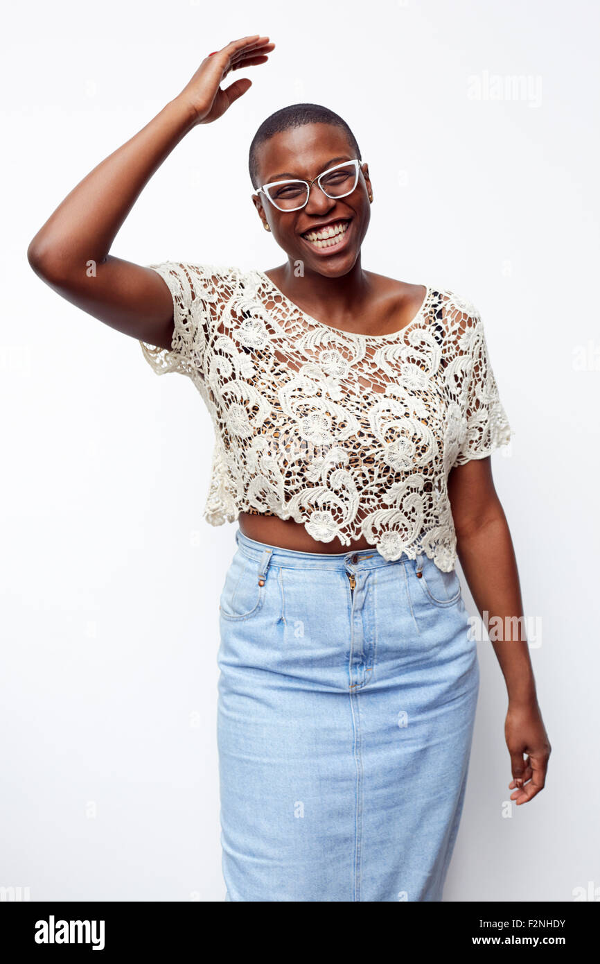 Stylish smiling woman wearing lace shirt Stock Photo