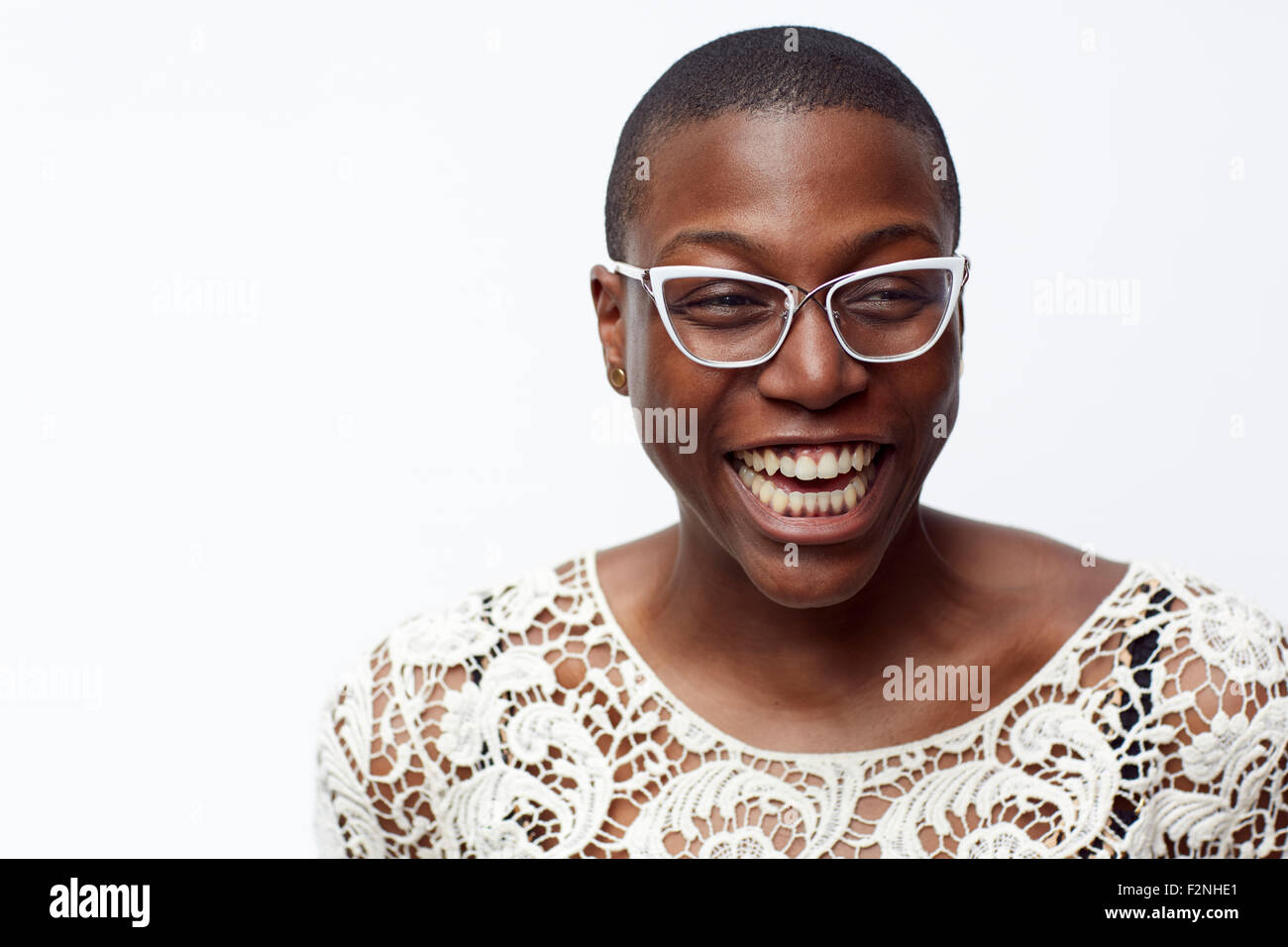 Smiling stylish woman wearing eyeglasses Stock Photo